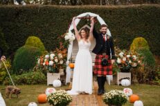 halloween micro wedding scotland back garden pumpkins decor arch humanist ceremony tie the knot