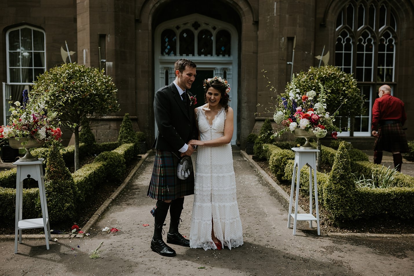 Drumtochty Castle outdoor wedding ceremony bride groom the flower pavilion bridal crown & colourful floral display chiffon and lace Catherine Deane bridal gown