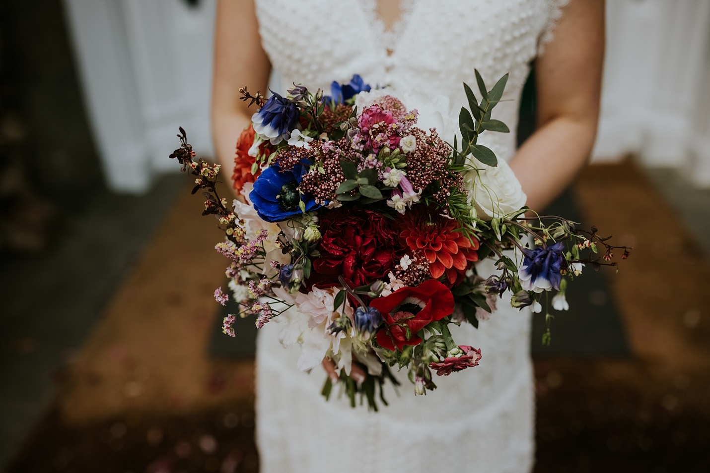 The Flower Pavilion red & blue bridal bouquet