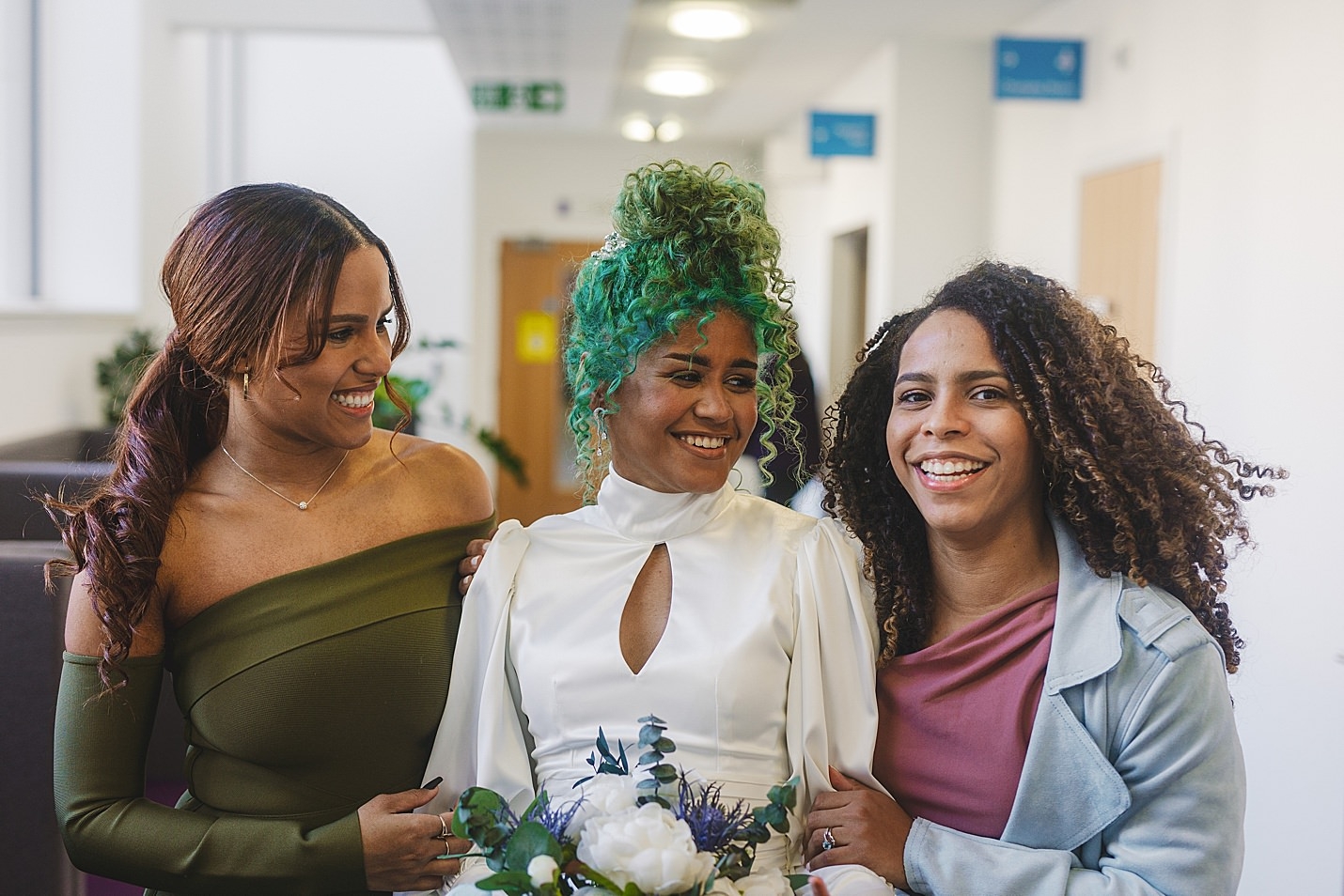 bride wearing white dress with green hair posing with two friends marischal college wedding clarke joss photography