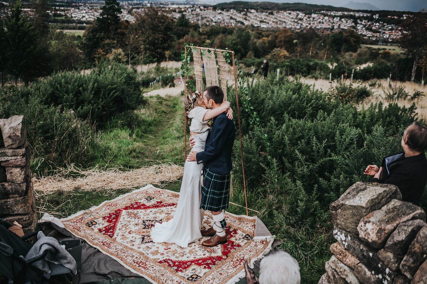 edinburgh outdoor micro wedding ceremony in pentland hills bride groom first kiss