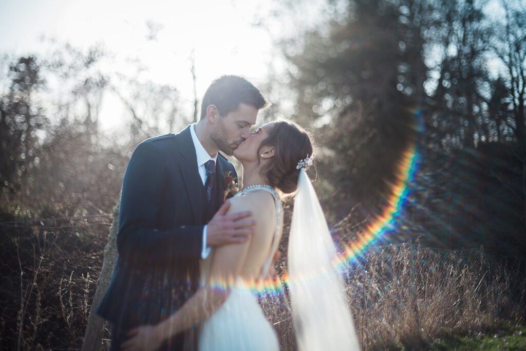 colstoun house wedding venue edinburgh bride groom portraits sun flare outdoors