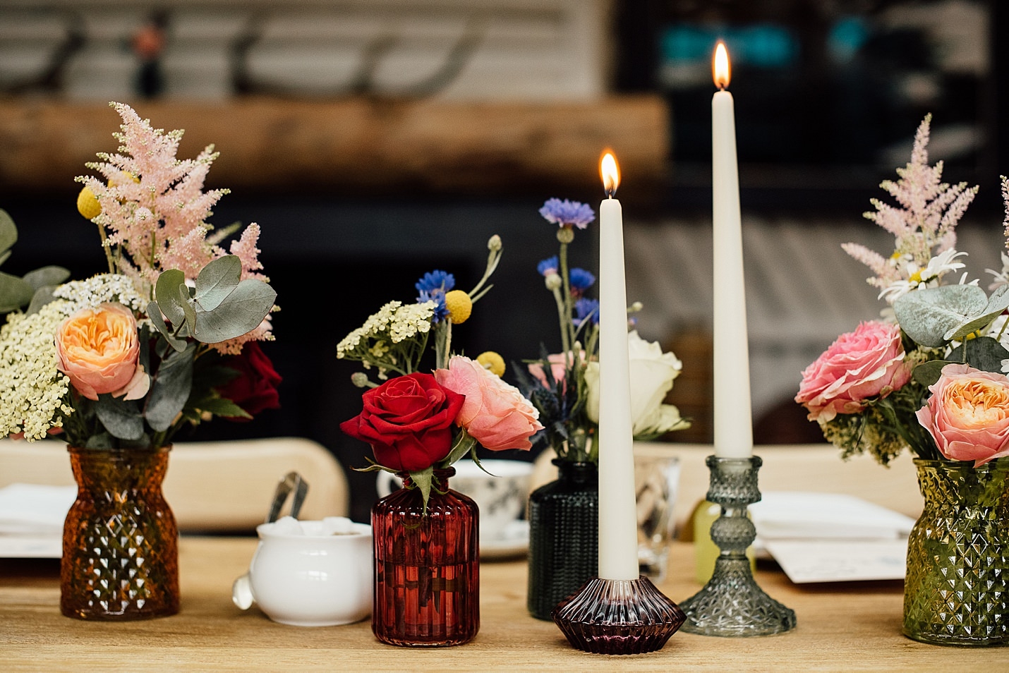fife arms hotel braemar colourful floral table styling glass candle stick tapered candles
